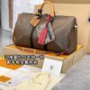 M56855 KEEPALL BANDOULIERE 50 Patchwork 50x29x23 cm